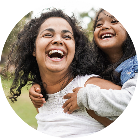 Mother and daughter laughing