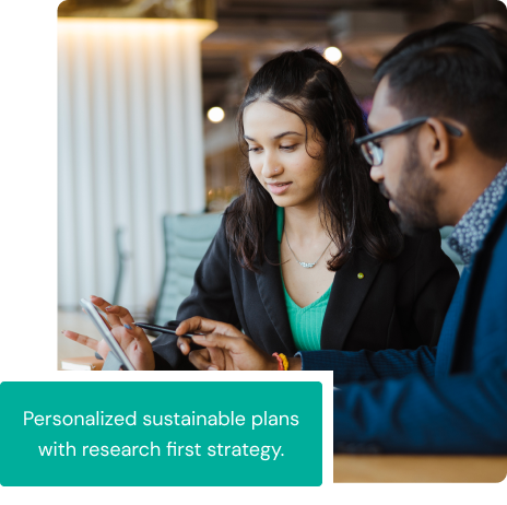 Advisor consulting with client - Personalized sustainable plans with research first strategy